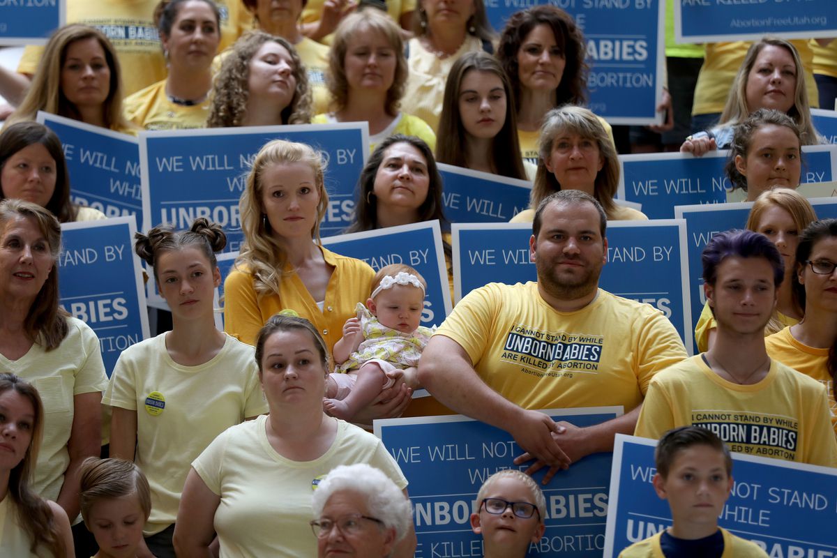 FILE - Members of the new group Abortion-Free Utah launch a campaign to end elective abortion in the state at the Capitol in Salt Lake City on Wednesday, June 19, 2019.