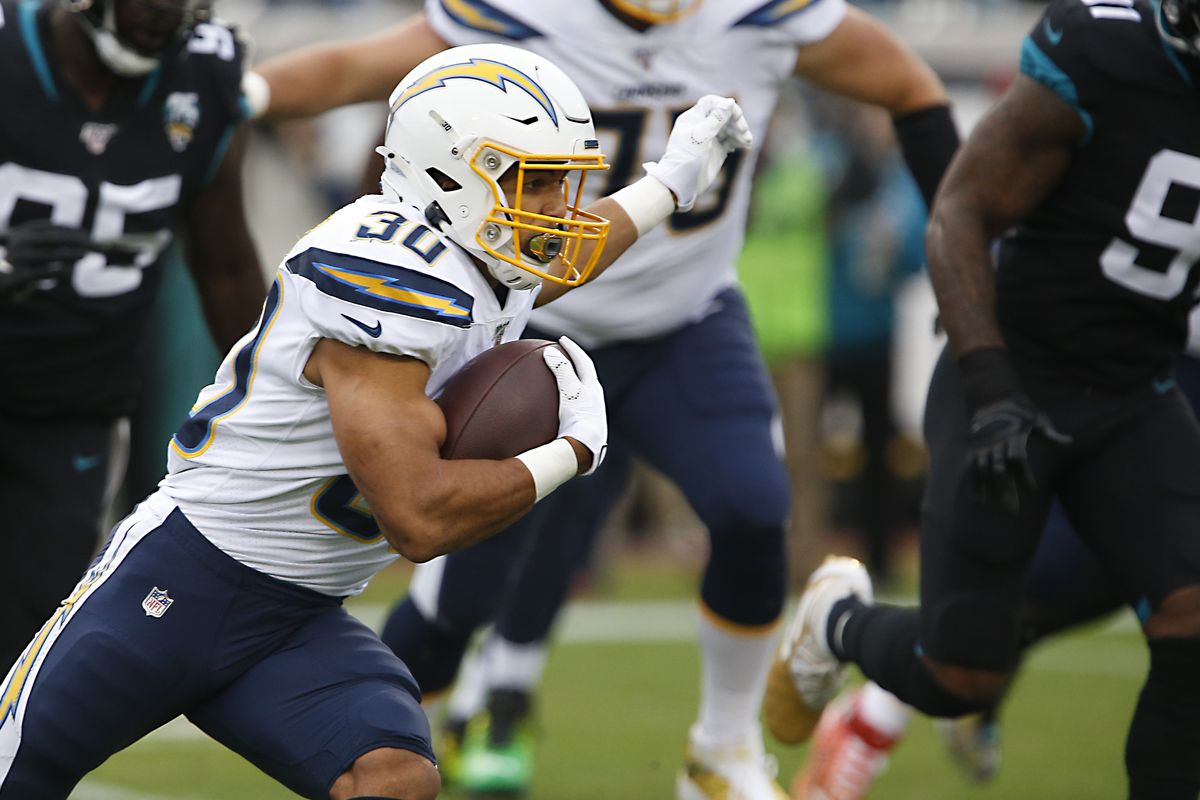 Los Angeles Chargers running back Austin Ekeler runs the ball during the first quarter against the Jacksonville Jaguars at TIAA Bank Field.
