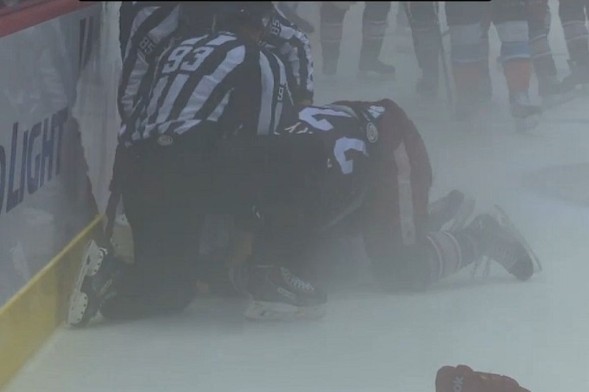 Louis-Marc Aubry and Harry Zolnierczyk fight in the fog during the Griffins vs Gulls game on October 10, 2015