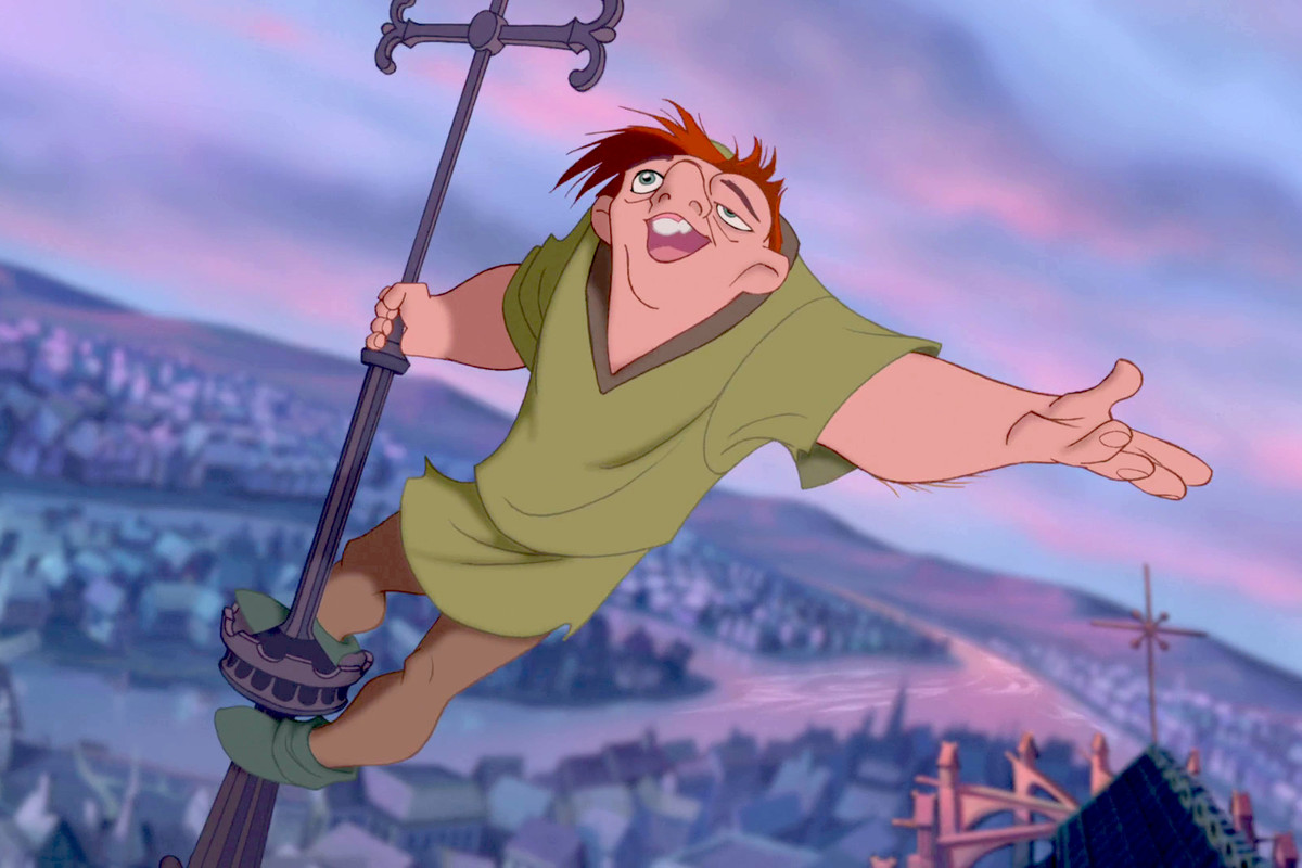 The Hunchback of Notre Dame - Quasimodo holding onto a rooftop cross. 