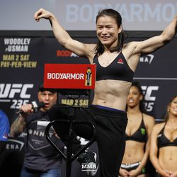 Weili Zhang poses at UFC 235 weigh-ins.