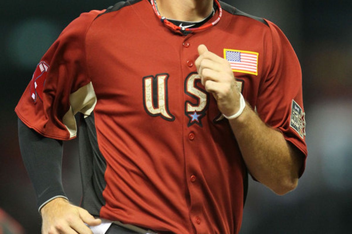 PHOENIX, AZ - JULY 10:  U.S. Futures All-Star Will Middlebrooks #16 of the Boston Red Sox winks as he runs on the field during the 2011 XM All-Star Futures Game at Chase Field on July 10, 2011 in Phoenix, Arizona.  (Photo by Jeff Gross/Getty Images)