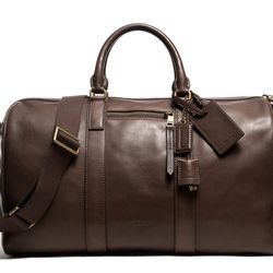 <a href="http://f.curbed.cc/f/Coach_SP_121113_duffle">Bleecker duffle in brass/mahogany leather</a>,  $698