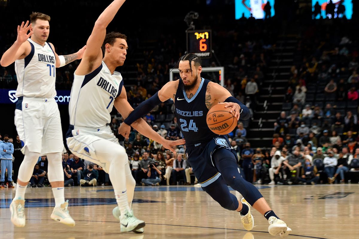 Dillon Brooks #24 of the Memphis Grizzlies goes to the basket against Dwight Powell #7 of the Dallas Mavericks during the second half at FedExForum on December 08, 2021 in Memphis, Tennessee.&nbsp;