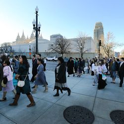 Conferencegoers make their way to the Conference Center in Salt Lake City prior to the morning session of the LDS Church’s 187th Annual General Conference on Saturday, April 1, 2017.