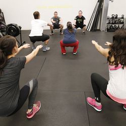 James Fitzgerald and his brother, Evan, teach a class at Gold's Gym in Ogden on Monday, Dec. 5, 2016. Fitzgerald, who has Down syndrome, teaches a fitness class with his brother, Evan, specifically for people with disabilities.