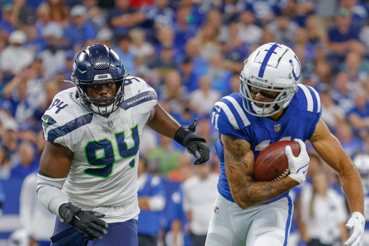 Michael Pittman #11 of the Indianapolis Colts runs the ball during the game against the Seattle Seahawks at Lucas Oil Stadium on September 12, 2021 in Indianapolis, Indiana.