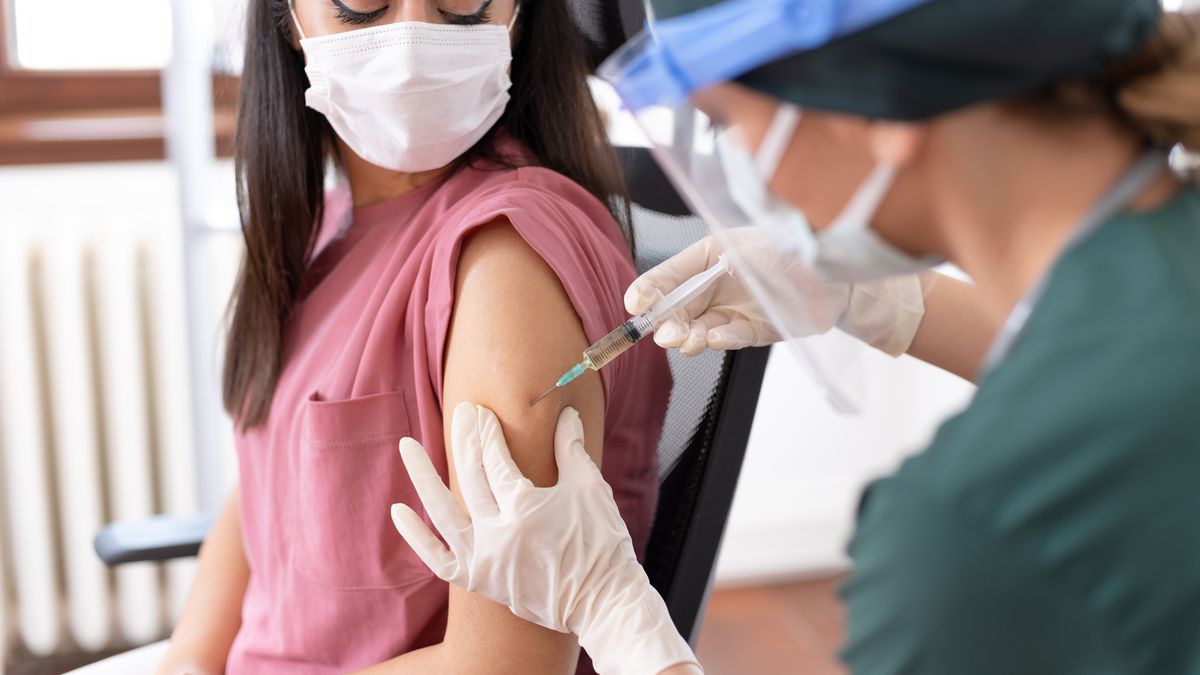A person getting their COVID-19 vaccine shot