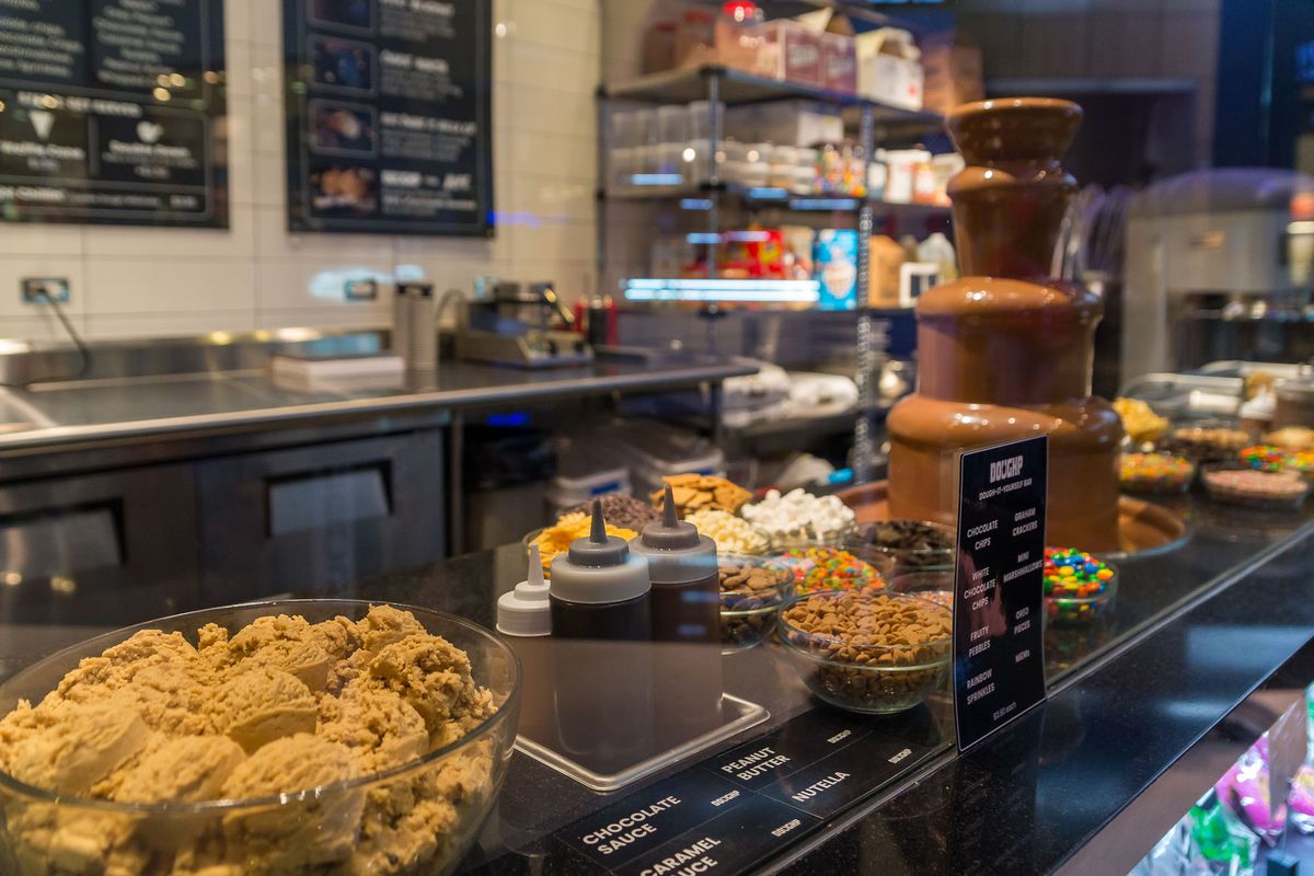 Counter at restaurant displaying cookie dough