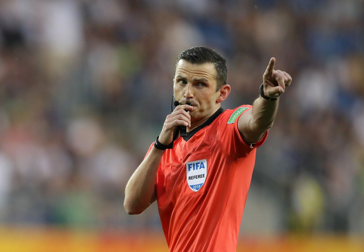 Referee Oliver Michael gives directions during the semi final match between Ecuador and South Korea at the U20 World Cup soccer in Lublin, Poland, Tuesday, June 11, 2019.