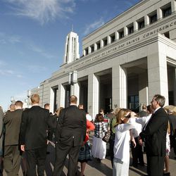 Attendees walk to the Conference Center prior to the 182nd Annual General Conference for The Church of Jesus Christ of Latter-day Saints in Salt Lake City  Saturday, March 31, 2012.