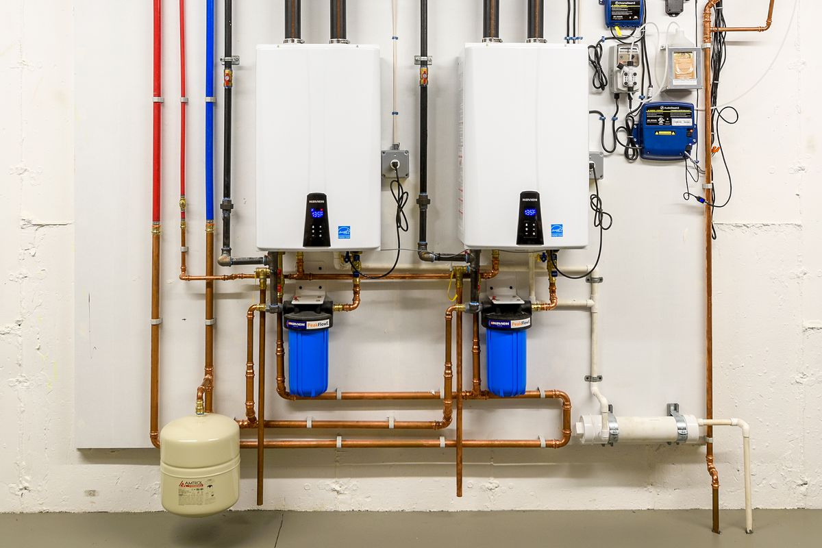 Hot water takes a long time to get to faucet Tankless Water Heaters A Buyer S Guide This Old House