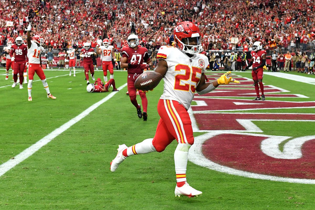 Running back Clyde Edwards-Helaire #25 of the Kansas City Chiefs reacts as he scores a touchdown during the second quarter of the game against the Arizona Cardinals at State Farm Stadium on September 11, 2022 in Glendale, Arizona.