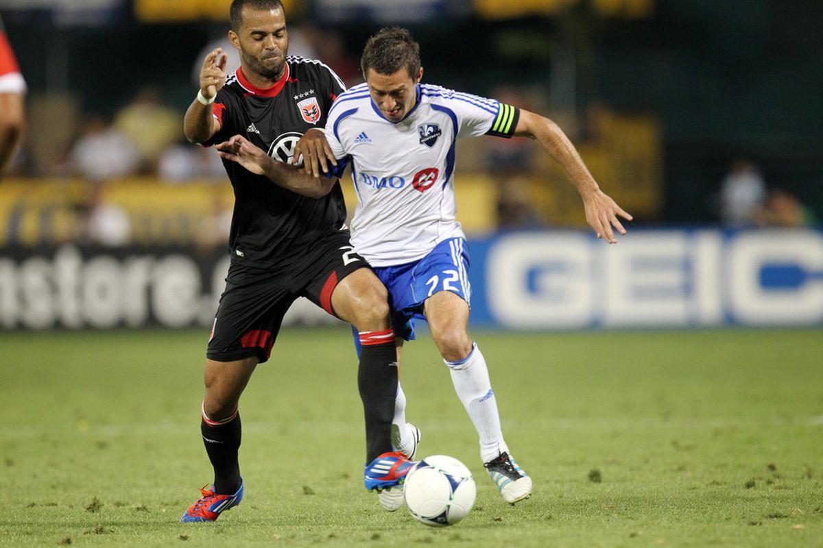 WASHINGTON, DC - JUNE 30: Davy Arnaud #22 of the Montreal Impact controls the ball against Maicon Santos #29 of D.C. United at RFK Stadium on June 30, 2012 in Washington, DC.(Photo by Ned Dishman/Getty Images)