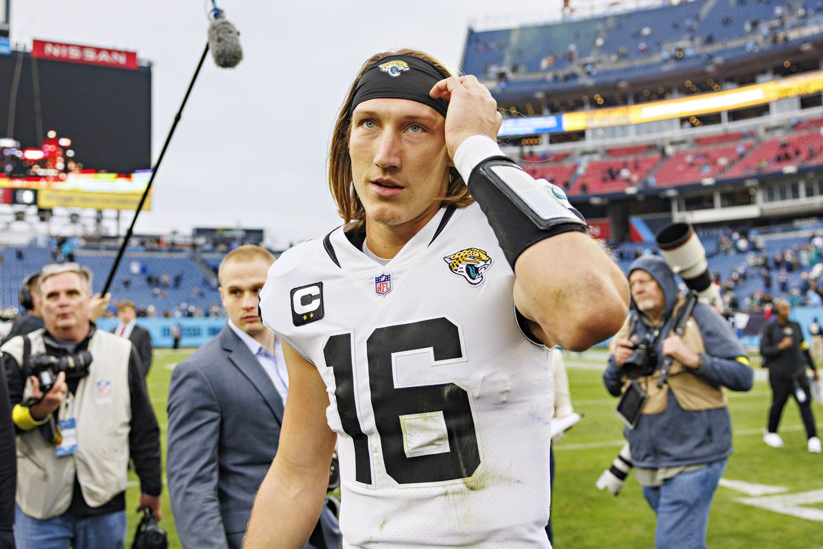 Trevor Lawrence #16 of the Jacksonville Jaguars walks off the field after a game against the Tennessee Titans at Nissan Stadium on December 11, 2022 in Nashville, Tennessee. The Jaguars defeated the Titans. The Jaguars defeated the Titans 36-22.
