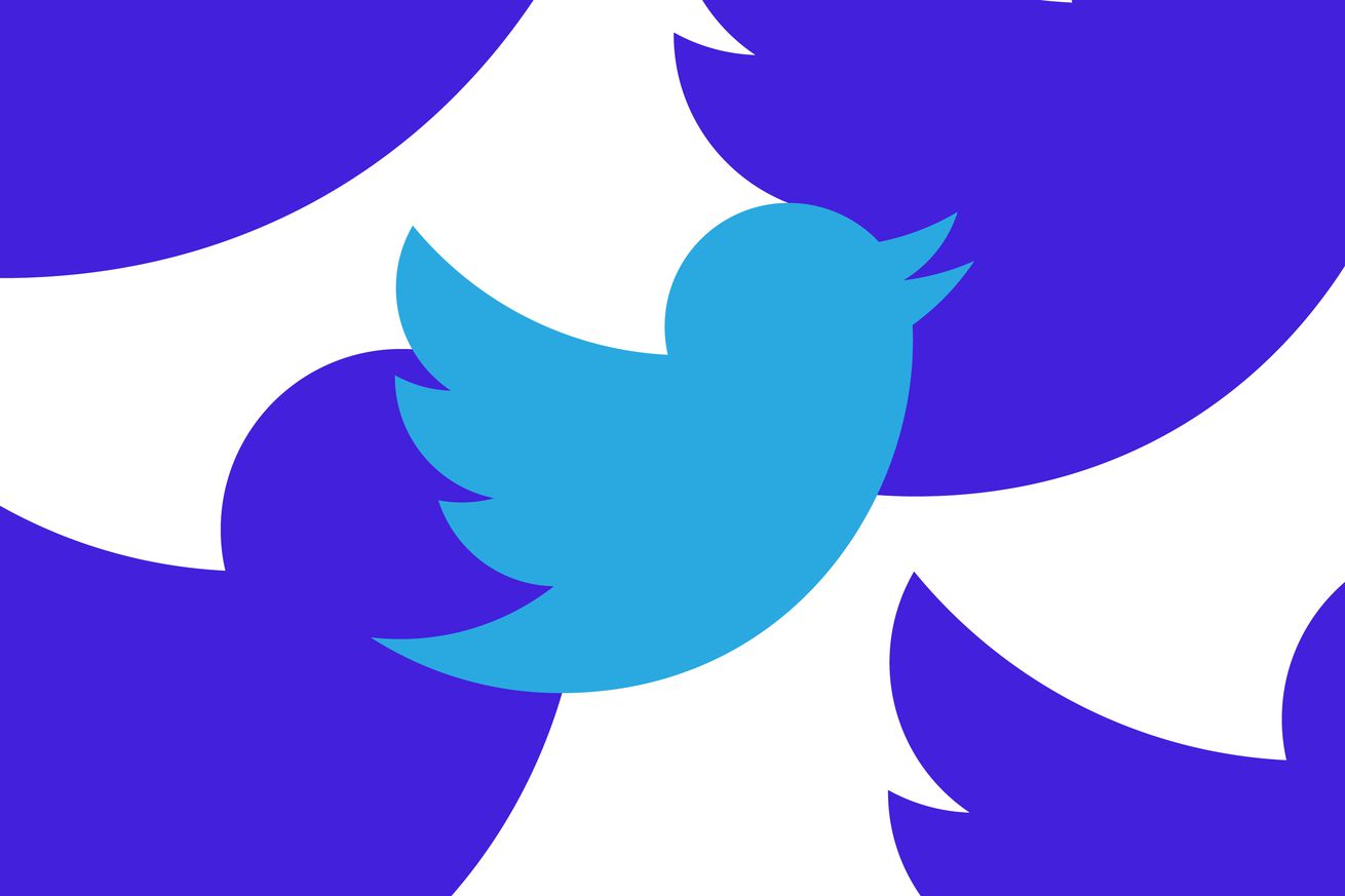 A blue Twitter bird logo with a repeating pattern in the background