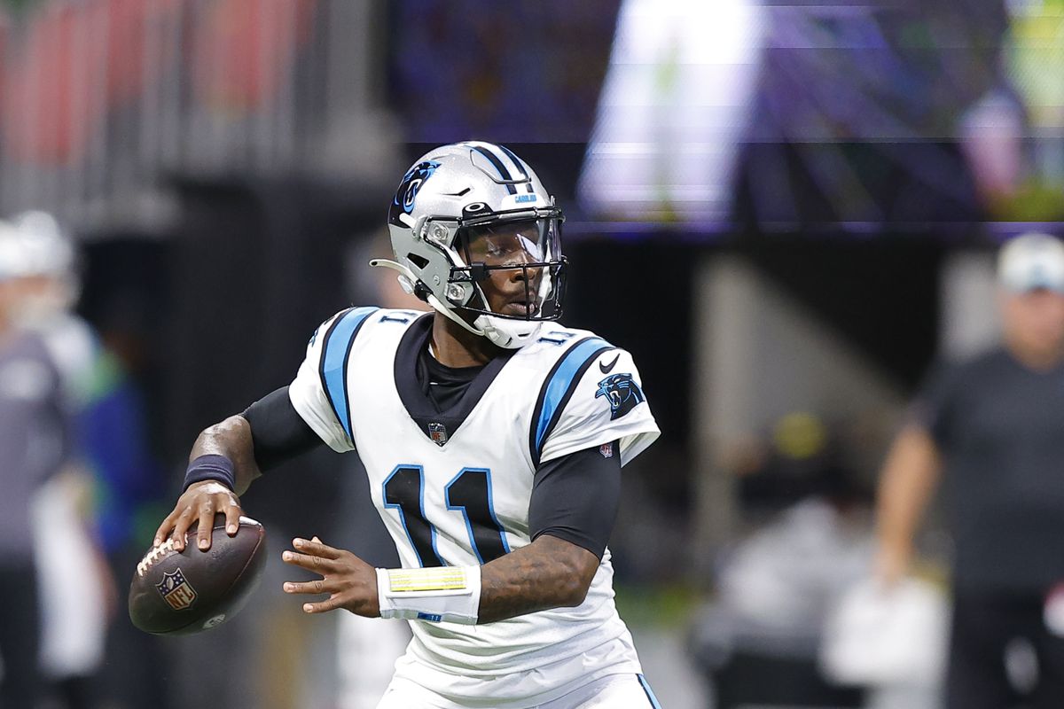 PJ Walker #11 of the Carolina Panthers looks to pass during the first half against the Atlanta Falcons at Mercedes-Benz Stadium on October 30, 2022 in Atlanta, Georgia.