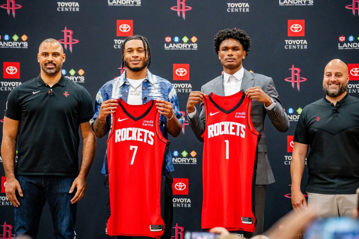 HOUSTON, TX - JUNE 26: Head Coach Ice, Cam Whitmore #7, Amen Thompson #1 and General Manager Raphael Stone of the Houston Rockets pose for a portrait on June 26, 2023 at the Toyota Center in Houston, Texas.&nbsp;