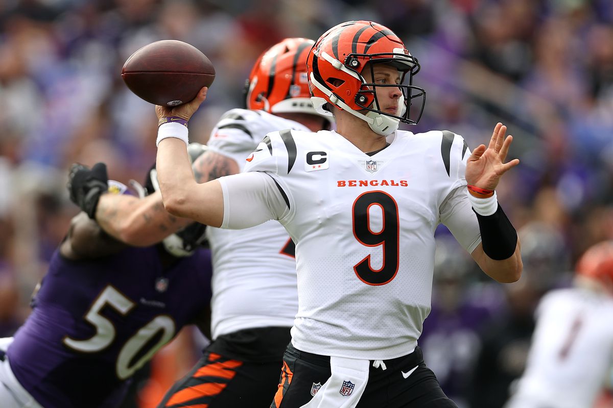 Quarterback Joe Burrow #9 of the Cincinnati Bengals drops back to pass against the Baltimore Ravens in the first half at M&amp;T Bank Stadium on October 24, 2021 in Baltimore, Maryland.