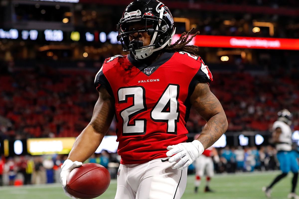 Devonta Freeman #24 of the Atlanta Falcons rushes for a touchdown against the Jacksonville Jaguars in the first quarter at Mercedes-Benz Stadium on December 22, 2019 in Atlanta, Georgia.