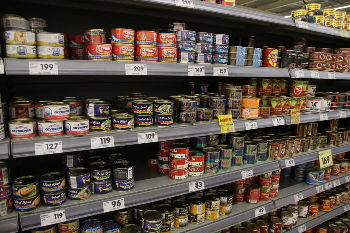 Canned fish seen displayed on the shelf of Verny Supermarket...