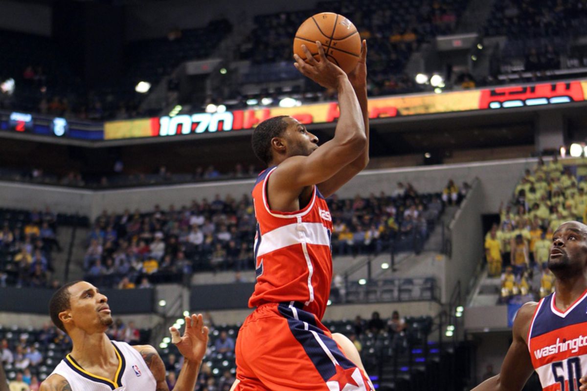 Nov. 10, 2012; Indianapolis, IN, USA; Washington Wizards guard A.J. Price (12) takes a shot against Indiana Pacers guard George Hill (3) at Bankers Life Fieldhouse. Mandatory Credit: Brian Spurlock-US PRESSWIRE