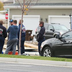 Unified firefighters and police respond to a fatal auto-pedestrian crash in Herriman on Tuesday, Nov. 1, 2016.