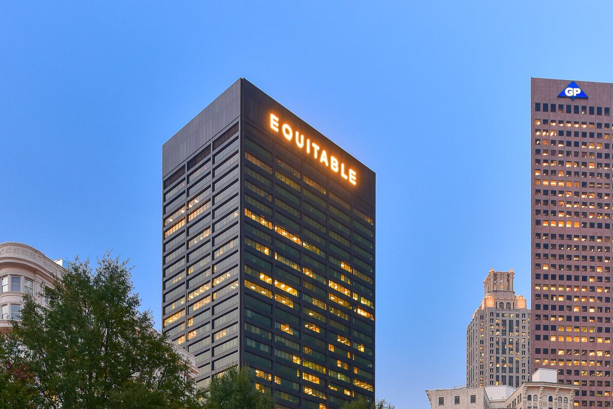 A photo of Woodruff Park and the Equitable Building in downtown Atlanta.