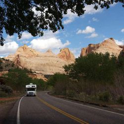 A RV travels down Highway 24, a scenic byway outside Capitol Reef.