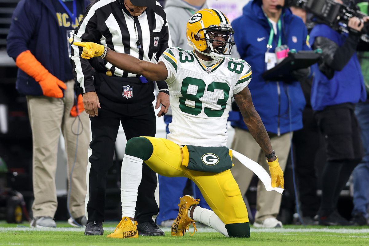 Marquez Valdes-Scantling #83 of the Green Bay Packers reacts after a first down catch against the Baltimore Ravens in the second quarter at M&amp;T Bank Stadium on December 19, 2021 in Baltimore, Maryland.