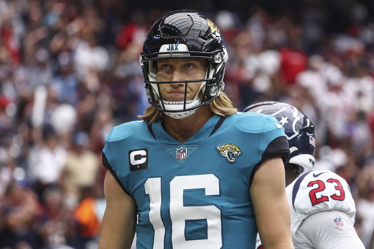 Jaguars quarterback Trevor Lawrence (16) reacts after throwing an interception during the second quarter against the Houston Texans at NRG Stadium.