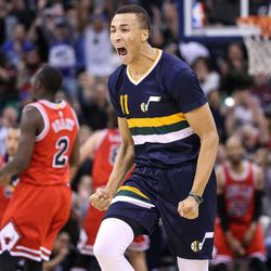 Utah Jazz guard Dante Exum (11) celebrates after hitting a 3-point shot at the shot-clock buzzer as the Jazz trail the Chicago Bulls in the final moments of a game Vivint Arena in Salt Lake City Thursday, Nov. 17, 2016.