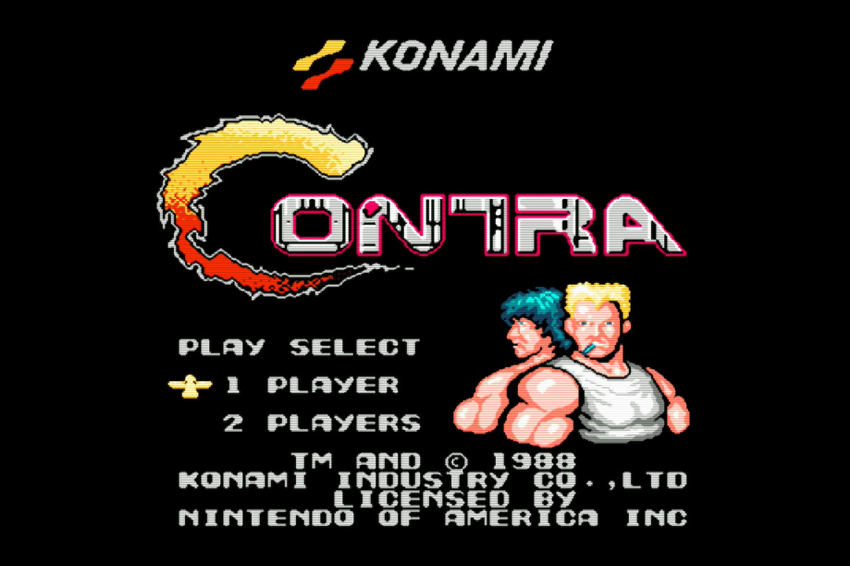 The title screen for Contra showing player selection and publishing credits