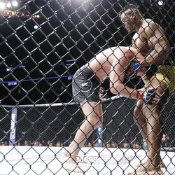Francis Ngannou looks for the submission at UFC 220.