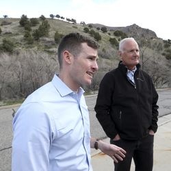 Jesse Dean, deputy director of the Central Wasatch Commission, and John Thomas, project manager for the Utah Department of Transportation, speak at the mouth of Big Cottonwood Canyon in Salt Lake City on Thursday, April 4, 2019. Leaders overseeing the Little Cottonwood Canyon Environmental Impact Statement and the Cottonwood Canyons Transportation Action Plan are considering potential solutions to improve Big and Little Cottonwood canyons and the surrounding area.