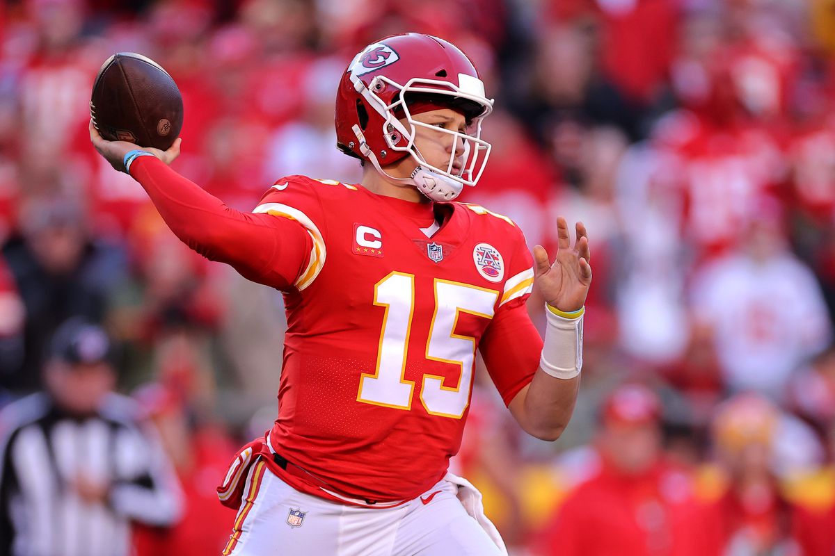 Quarterback Patrick Mahomes #15 of the Kansas City Chiefs throws a second half pass against the Cincinnati Bengals in the AFC Championship Game at Arrowhead Stadium on January 30, 2022 in Kansas City, Missouri.