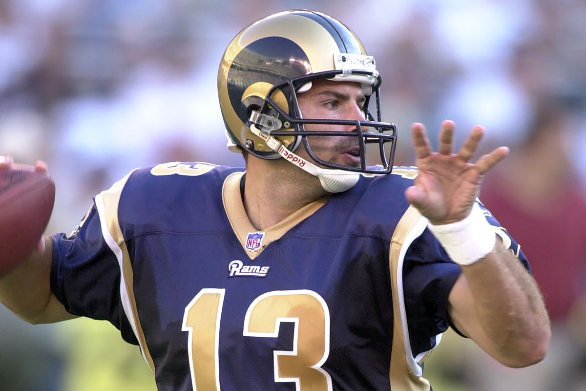 Curt Warner #13 of the St. Louis Rams throws a pass during a NFL football game against the Philadelphia Eagles on September 9, 2001 at Veterans Stadium in Philadelphia, Pennsylvania.