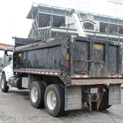 3:24 p.m. Dump truck parked on Waveland - 