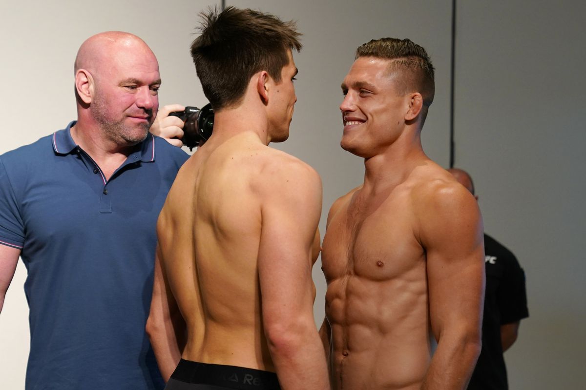 Opponents Alexander Hernandez and Drew Dober face off during the official UFC Fight Night weigh-in on May 12, 2020 in Jacksonville, Florida.