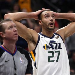 Utah Jazz center Rudy Gobert (27) watches a replay during a basketball game against the New York Knicks at the Vivint Smart Home Arena in Salt Lake City on Friday, Jan. 19, 2018.