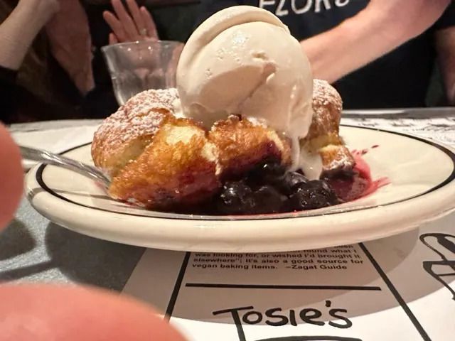Funnel cake with blueberry compote and gelato.