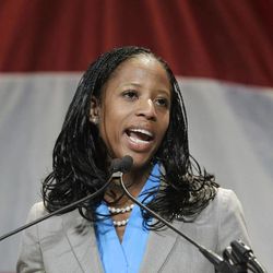 Saratoga Springs Mayor Mia Love addresses the Utah Republican Party's annual organizing convention Saturday, May 18, 2013, in Sandy, Utah. Love is officially announcing she wants another shot to challenge Democratic U.S. Rep. Jim Matheson in 2014. Love made the announcement Saturday while addressing delegates at the convention. Love narrowly lost to Matheson last November in one of the country's most heavily GOP districts. The race was one of the most expensive in Utah history, with the candidates spending a combined $11.2 million. 