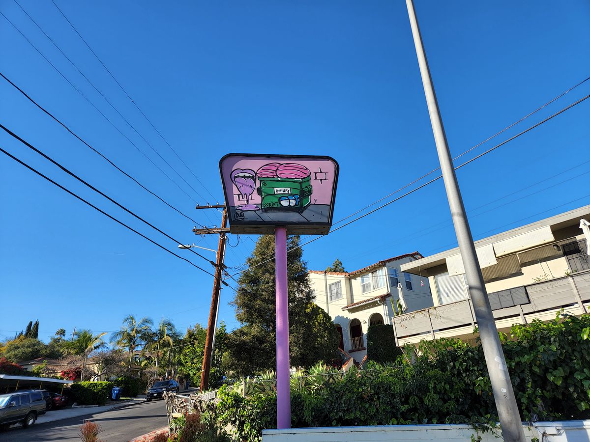 Parking sign for hot tongue pizza in Silver Lake, California
