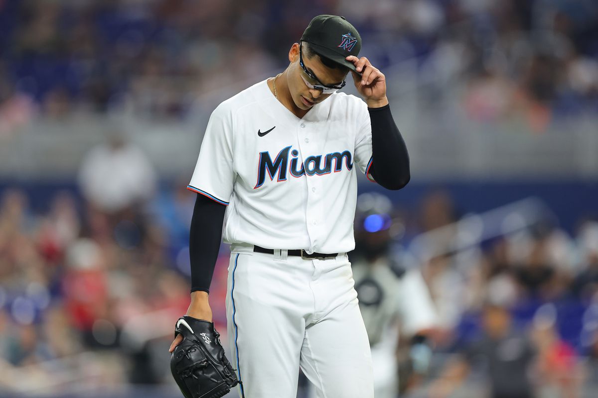 Jesus Luzardo #44 of the Miami Marlins reacts after retiring the side in the sixth inning against the Seattle Mariners at loanDepot park on April 30, 2022 in Miami, Florida.