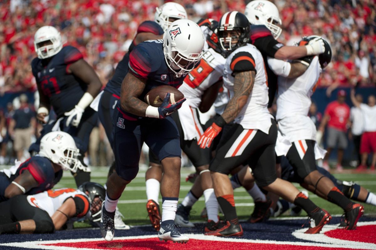 Arizona ran past a dismayed Oregon State defense time and again on Saturday.