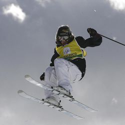 In this March 12, 2008 file photo, Sarah Burke of Canada is airborne as she competes in the women's halfpipe freestyle event at the World Cup finals in Valmalenco, Italy. Burke succumbed to injuries Thursday morning that she sustained in a fall Jan. 10 while training in the superpipe at Park City Mountain Resort.