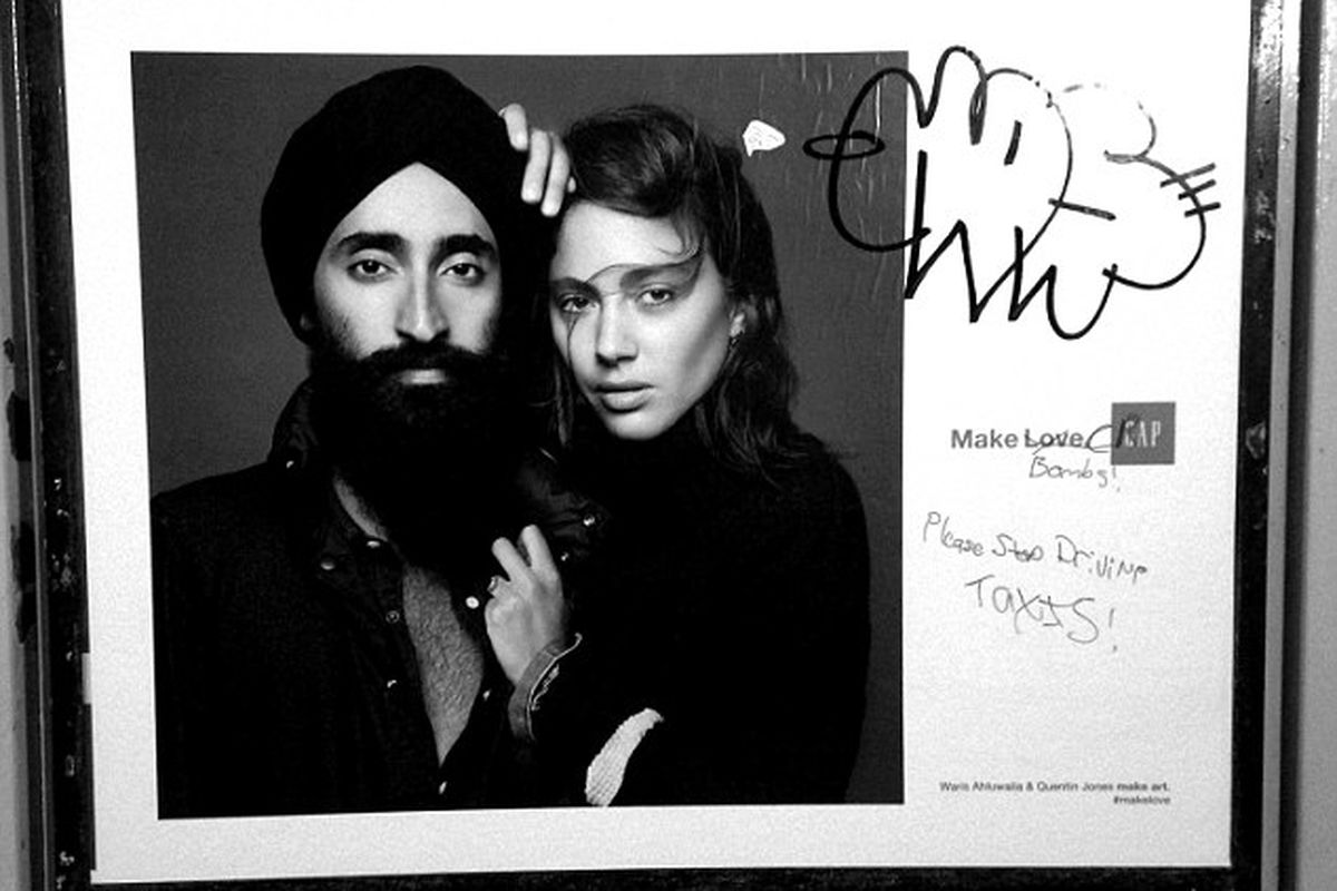 Image via <a href="http://www.dailymail.co.uk/femail/article-2513525/Gap-slams-racist-graffiti-ad-featuring-Sikh-Waris-Ahluwalia-vandalized.html">The Daily Mail</a>.