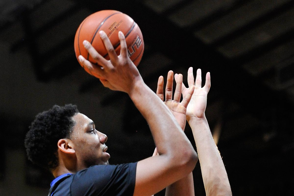 Jahil Okafor goes for a basket against Virginia Tech's Satchel Paige