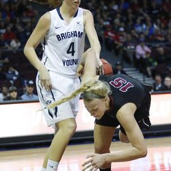 Brigham Young Cougars forward Amanda Wayment (4)  and Santa Clara Broncos forward Marie Bertholdt (15) fight for the ball during the WCC tournament in Las Vegas Monday, March 7, 2016. BYU won 87-67.