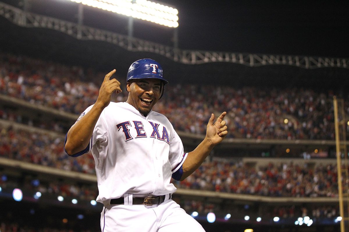 ARLINGTON, TX - JUNE 29:  Elvis Andrus #1 of the Texas Rangers celebrates scoring on a forced walk against the Oakland Athletics at Rangers Ballpark in Arlington on June 29, 2012 in Arlington, Texas. (Photo by Rick Yeatts/Getty Images)